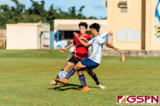 SJS Knight Jason Palomares and HCA Eagle Christian Shinohara battle for the ball. (Photo by Michael Blas)
