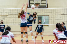 AOLG Cougar Gabriella Mata finds an opening through SJS Knight Lane Murrell's block. (Photo by Michael Blas)