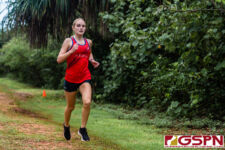 St. John's Knight Jordan Baden finishes first in the girls division and third overall. (Photo by Michael Blas)