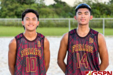 Hoben Barcinas and Joseph Mafnas advances to the next round of the IIAAG Boys Beach Volleyball Tournament. (Photo by Michael Blas)