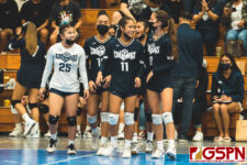The AOLG Cougars make their way back on the court with a comfortable lead in the final set. (Photo by Michael Blas)