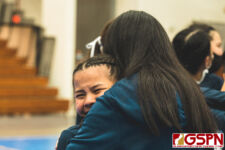 AOLG Cougar Isabella Paulino celebrates with family after being crowned champions. (Photo by Michael Blas)