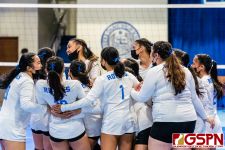 The ND Royals celebrate after defeating the GHS Panthers in the fourth set. (Photo by Michael Blas)