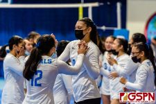 ND Royals Faith Piper and Senaiyath Bell celebrate after taking a set. (Photo by Michael Blas)