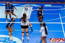 GHS Panther Kamryn Thompson spikes through ND Royal Mercedes Mendiola-Cruz. (Photo by Michael Blas)