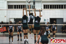 SSHS Shark Hanna Meinik goes up against JFK Islanders Jae Almonte and Tommie-Lyn Santos. (Photo by Michael Blas)