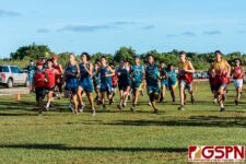 The boys division burst out the starting line in the IIAAG All Island Cross Country race. (Photo by Michael Blas)