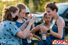 GHS Panther Rebekah Stringham celebrates with family after finishing in the top five. (Photo by Michael Blas)