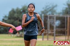 SSHS Shark Jena Arriola crosses the finish line at second place. (Photo by Michael Blas)