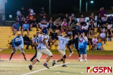 GHS Panther Benjamin Harris makes the reception agaisnt GW Gecko Jaden Santos. (Photo by Michael Blas)