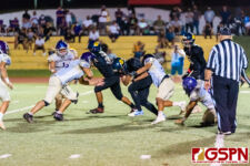 GHS Panther Deshawn Baird blazes through the line of scrimmage for a first down. (Photo by Michael Blas)