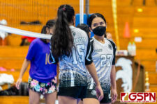 SSHS Sharks Janelle Almoite and Kayna Kanemoto talk strategy before the volley begins. (Photo by Michael Blas)