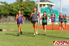 SSHS Shark Marie Gatbonton, along with GW Gecko Robin Cruz and JFK Islander Trixia Nierva, lead out of the first section of the ISA All-Island race. (Photo by Michael Blas)