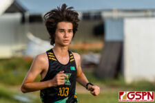 JFK Islander Hugh Kent maintains his lead through the midway point of the race. (Photo by Michael Blas)