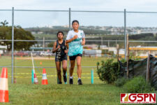 SHS Dolphin Cheyunne Ahn and THS Titan Aubrey Blas run through the short turn and incline. (Photo by Michael Blas)