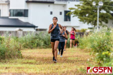 SSHS Shark Jena Arriola leads the mid-pack out of the jungle portion of the race. (Photo by Michael Blas)