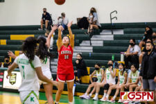 St. John's Knight Jadyn Palomares tries from downtown in the first half. (photo by Robert Balajadia)