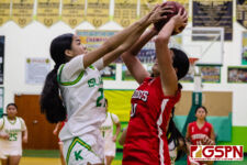 JFK Islander Laila Smartt gets two hands on a block that was called a foul. (photo by Robert Balajadia)