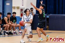 HCA Eagle Alex Oralles looks for an open man. (Photo by Michael Blas)