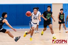 HCA Eagle Sunchan Lee sprints down court on a fast break. (Photo by Michael Blas)