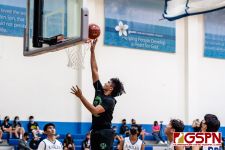 JFK Islander Kirston Guzman finds an open shot under the net. (Photo by Michael Blas)