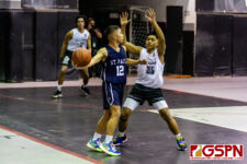 SPCS Warrior Kristian Santos looks for an open man in the closing minutes of the game. (Photo by Michael Blas)