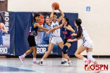 AOLG Cougar Mia Taitano looks for the open man against the Bulldog pressure. (Photo by Michael Blas)