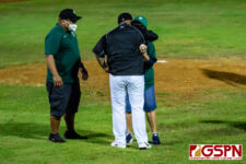 UOG Triton Head Coach Roke Alcantara Jr. gives a hug to Governor Lou Leon Guerrero after the first pitch (Photo by Michael Blas)