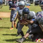 Island Broncos Rhyler Jojuan Cruz runs the ball through the defense after the catch. (photo by Bout It Productions)