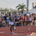 This Friday's IIAAG Track & Field Meet moves to the ocean scenery of J.F.K High. The sweltering heat was on but the fans and athletes still put on a show. (photo by Bout It Productions)