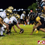 The Tiyan Titans defeat the JFK Islanders 6-0 in their IIAAG High School Football game Saturday evening. (Photo by Michael Blas)