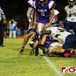 George Washington Geckos Shelby Meeks drives the ball into the end zone for a touchdown. (Photo by Michael Blas)