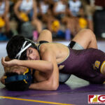 High School wrestlers hit the mats in a Preseason Tournament held at the FD Jungle. (photo by Bout It Productions.)