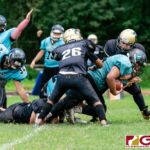 Southern Dolphin Tanner Calvo powers his way straight up the middle for a touchdown. (Photo by Michael Blas)