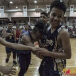 GDOE Public School celebrate their victory after Hendrix De Fiesta hits the go-ahead 3 pointer for the win. (photo by Bout It Productions)