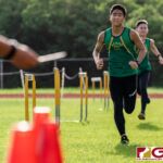 JFK Islander Mark Imazu on the final stretch while teammate Taiga Sato trails. (Photo by Michael Blas)