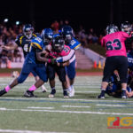 Southern High Dolphins Gabriel Stanley gets slammed by the Guam High Panthers defense. (Photo by Michael Blas)