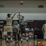 Team Elite's Lawrence Tisalona shoots from downtown with Team Supreme's Peter Cruz defending. (photo by Bout It Productions)