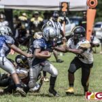 Southern Cowboys Bobby Junior Taisipic runs up the middle for a short gain. (photo by Bout It Productions)