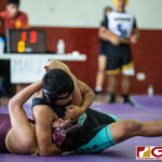 High School wrestlers hit the mats in a Preseason Tournament held at the FD Jungle. (photo by Bout It Productions.)