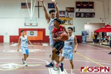 St. John's Knight Adam Cruz drives to the basket early in the first quarter. (Photo by Michael Blas)