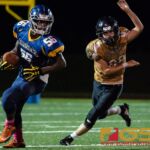 Guam High Panthers Jeylyn Dowdell breaks through several tackles and gains huge yardage on a punt return late in the 4th quarter. (Photo by Michael Blas)