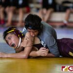 High School wrestlers hit the mats in a Preseason Tournament held at the FD Jungle. (photo by Bout It Productions.)