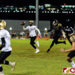 Tiyan Titan Kaekoa Leon Guerrero launches to his receiver as Islander Nico Velez pressures for the interception. (Photo by Michael Blas)
