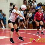 St. John's Knights Tammy Lee bumps the ball after a serve from the Notre Dame Royals. (Photo by Michael Blas)