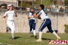 Academy Cougar Jordan Limtiaco makes the catch to out Southern's run at first base. (Photo by Michael Blas)