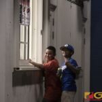 Mathew and Gavin take time out in between innings to get some snacks at the concession stand before heading back to watch their 76 Expos play ball. (Photo by Bout It Productions)