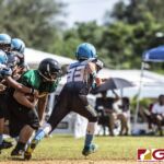 Guam Packers John Castro picks up a loose ball. The play was eventually called back for a down ball. (photo by Bout It Productions)