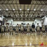 Team Elite & Team Supreme stand in line before the start of the 2019 Wendy's All-Star Basketball Game. (photo by Bout It Productions)