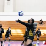 The Tiyan High Titans JV Team head down south to the Southern High Dolphins JV Team territory to compete in the ISA Girls Volleyball matchup. Photo by Bout It Productions.